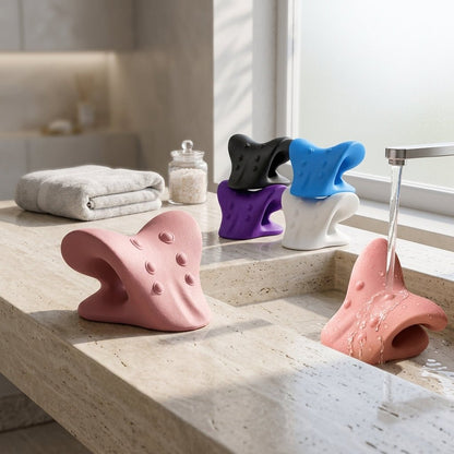 Aligno Relax neck stretchers in several colors beside a bathroom sink, easy to wash